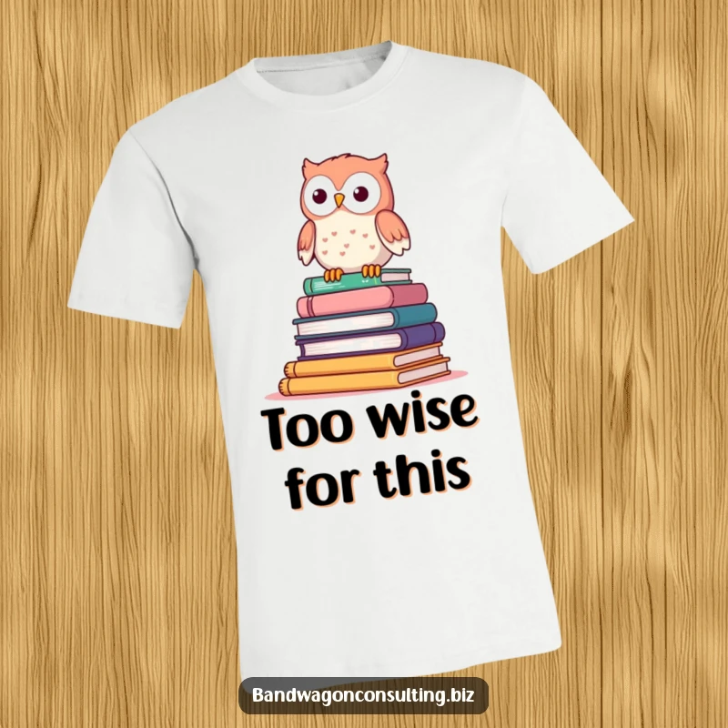 Funny t-shirt depicting a cute owl character perched on top of a teetering stack of books.